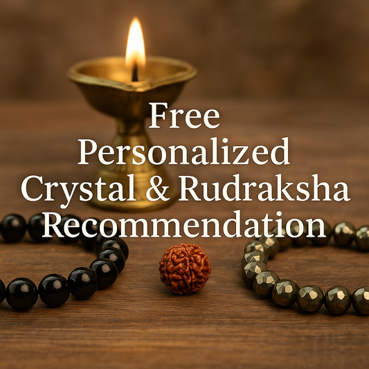 Crystal and Rudraksha beads with a lit candle on a wooden surface, promoting a free personalized crystal and Rudraksha recommendation.