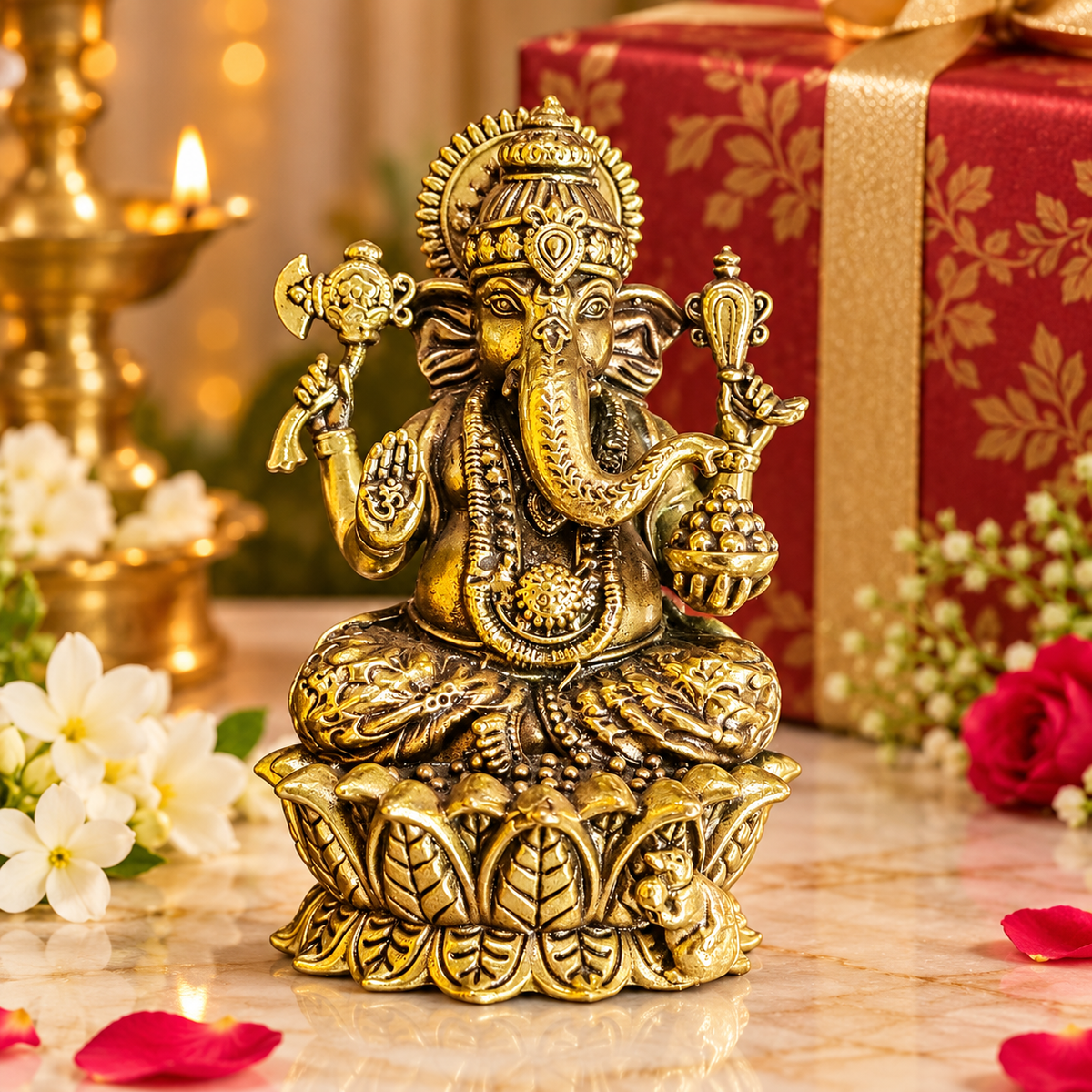 Decorative Ganesha idol presented in a warm festive setting for spiritual gifting