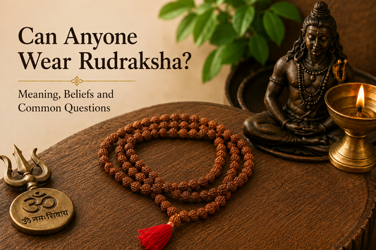 Traditional Rudraksha mala with Lord Shiva statue and diya in a peaceful spiritual setting representing Rudraksha wearing beliefs and spirituality