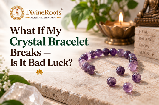 DivineRoots blog hero image showing a broken Amethyst crystal bracelet with scattered beads in a calm spiritual setting, representing the question of whether a broken crystal bracelet means bad luck or simply needs practical repair.