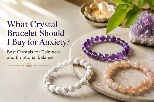 Amethyst, White Howlite and Peach Moonstone crystal bracelets arranged in a calming spiritual setting for anxiety relief and emotional balance