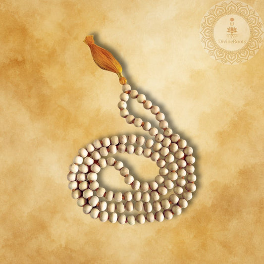 Mala necklace with wooden bead on a beige background