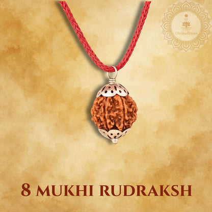 8 Mukhi Rudraksh pendant on a red cord with a gold cap against a beige background