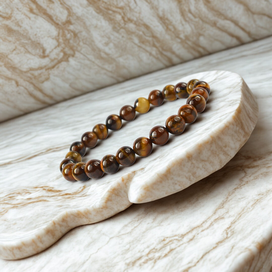 Tiger Eye Gemstone Bracelet on a marble surface