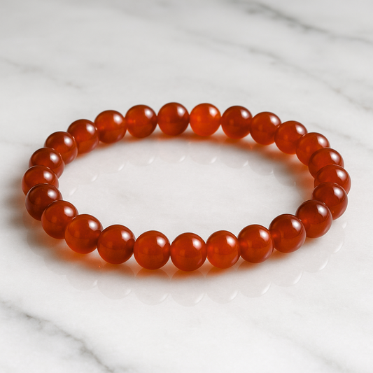 Red Carnelian Gemstone Bracelet on a marble surface