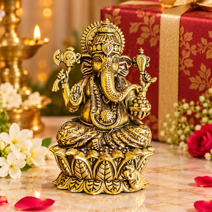 Decorative Ganesha idol presented in a warm festive setting for spiritual gifting
