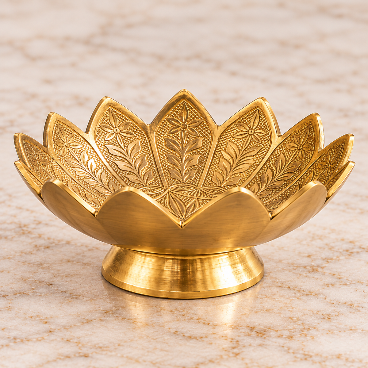 Side view of brass lotus-shaped decorative bowl with scalloped petals and raised circular pedestal
