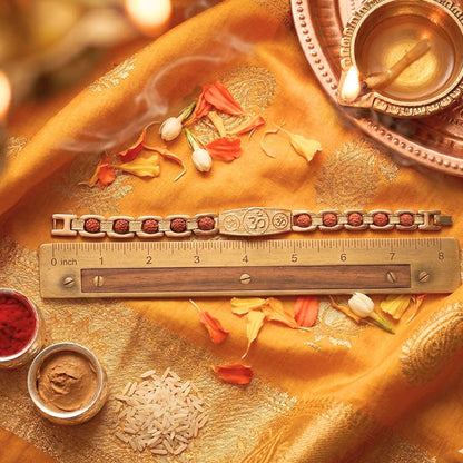 Gold plated Rudraksha bracelet showing 8 inch length measurement