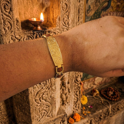 Man wearing premium Om Rudraksha bracelet gold plated DivineRoots
